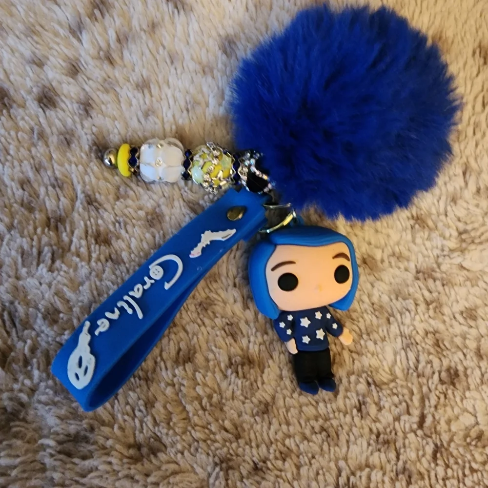 Coraline Blue Shirt Star Blue Pom Pom Key Holder with Character Charm Beaded